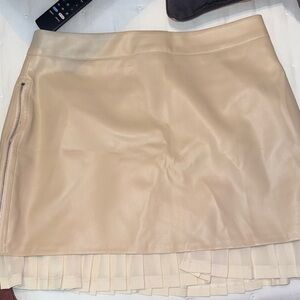 Begin leather skirt with material detailing